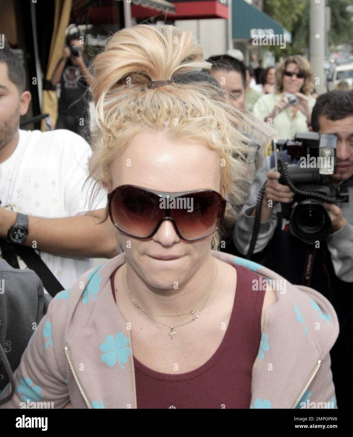 Britney Spears pays a visit to the children's boutique Bel Bambini today  and was escorted out of the shop to her brand new Mercedes SL65 with the  help of police and a shop assistant. By the looks of her bags on the way  out, it seems Britney bought her two ...