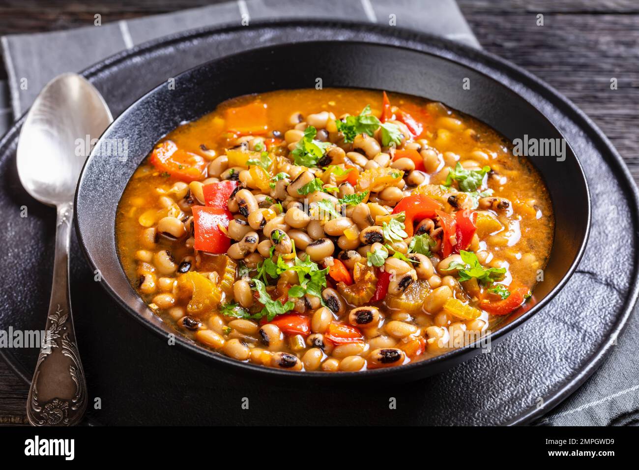 closeup of Vegan Hoppin John, savory and spicy blackeyed pea stew in