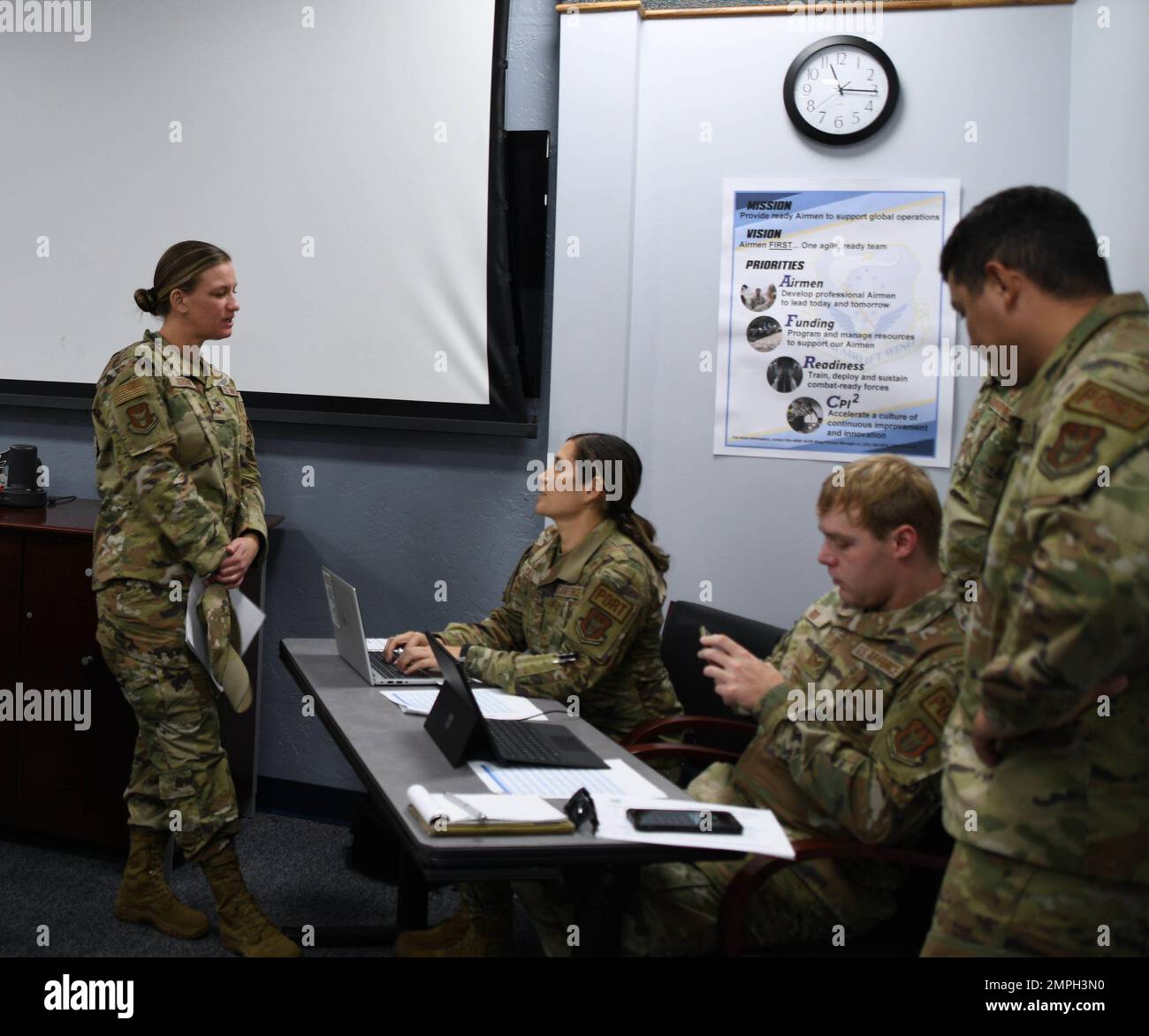 Air Force Reservists assigned to the 36th Aerial Port Squadron review a ...