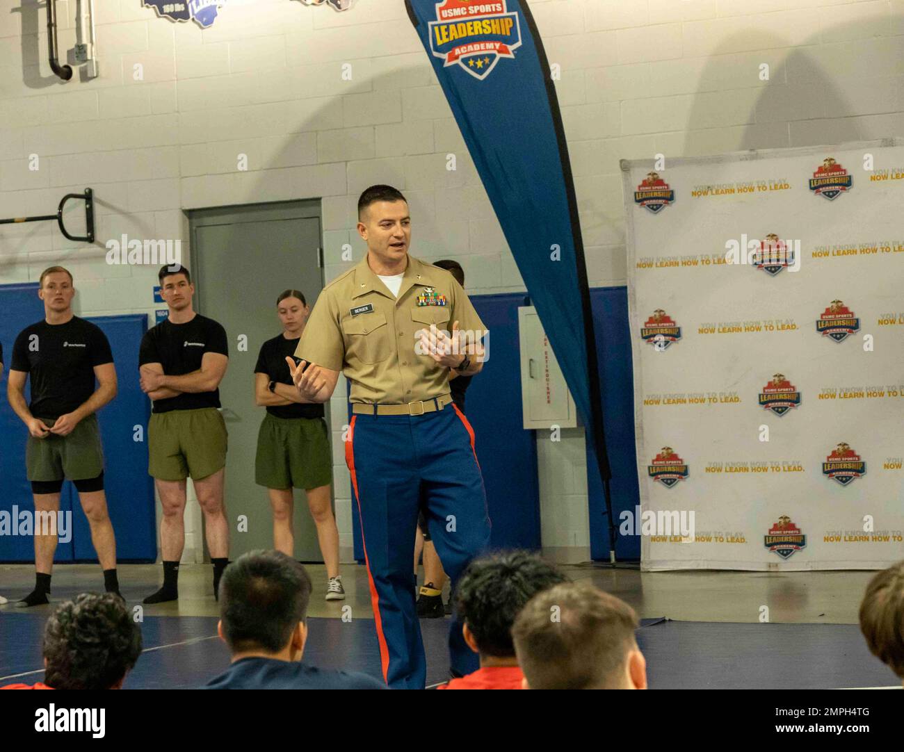 U.S. Marine Corps Major Ryan C. Berger, Commanding Officer of Marine Corps Recruiting Station Columbus, discusses leadership with high school wrestlers at the United States Marine Corps Sports Leadership Academy October 15, 2022, at Olentangy Liberty High School in Columbus, Ohio. The United States Marine Corps Sports Leadership Academy is a free event that helps high school wrestlers strengthen their wrestling skills and learn leadership principles from Marines. Stock Photo