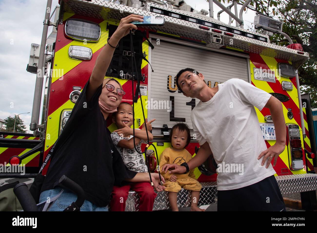 YOKOSUKA, Japan (Oct. 16, 2022) – Local Japanese community members pose ...