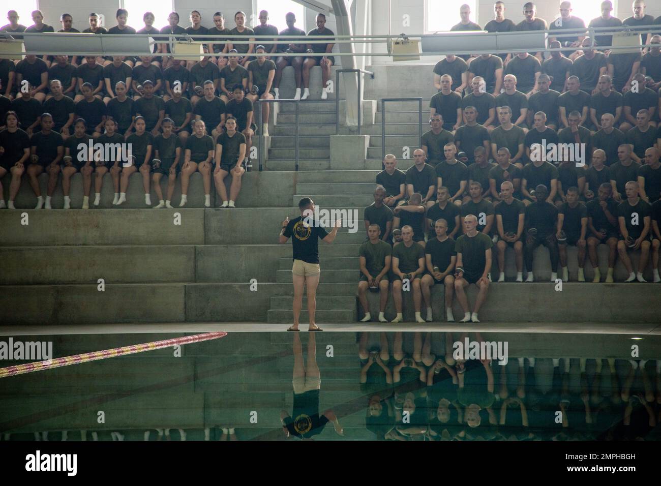 U.S. Marine Corps recruits with Charlie Company, 1st Recruit Training Battalion, receive