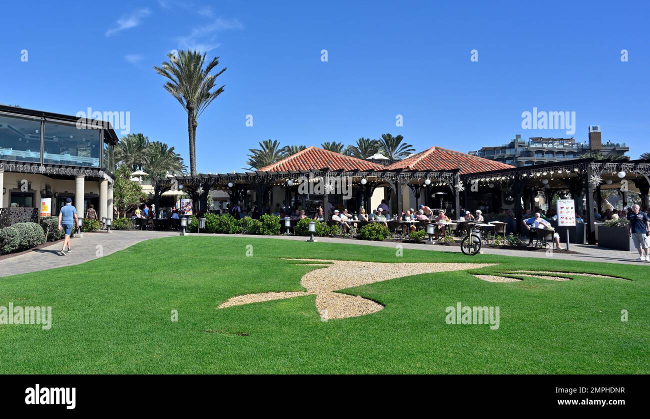 Building, bars, eating out beside park in Lopesan, Boulevard el Faro shopping centre, near the lighthouse, Gran Canaria Stock Photo