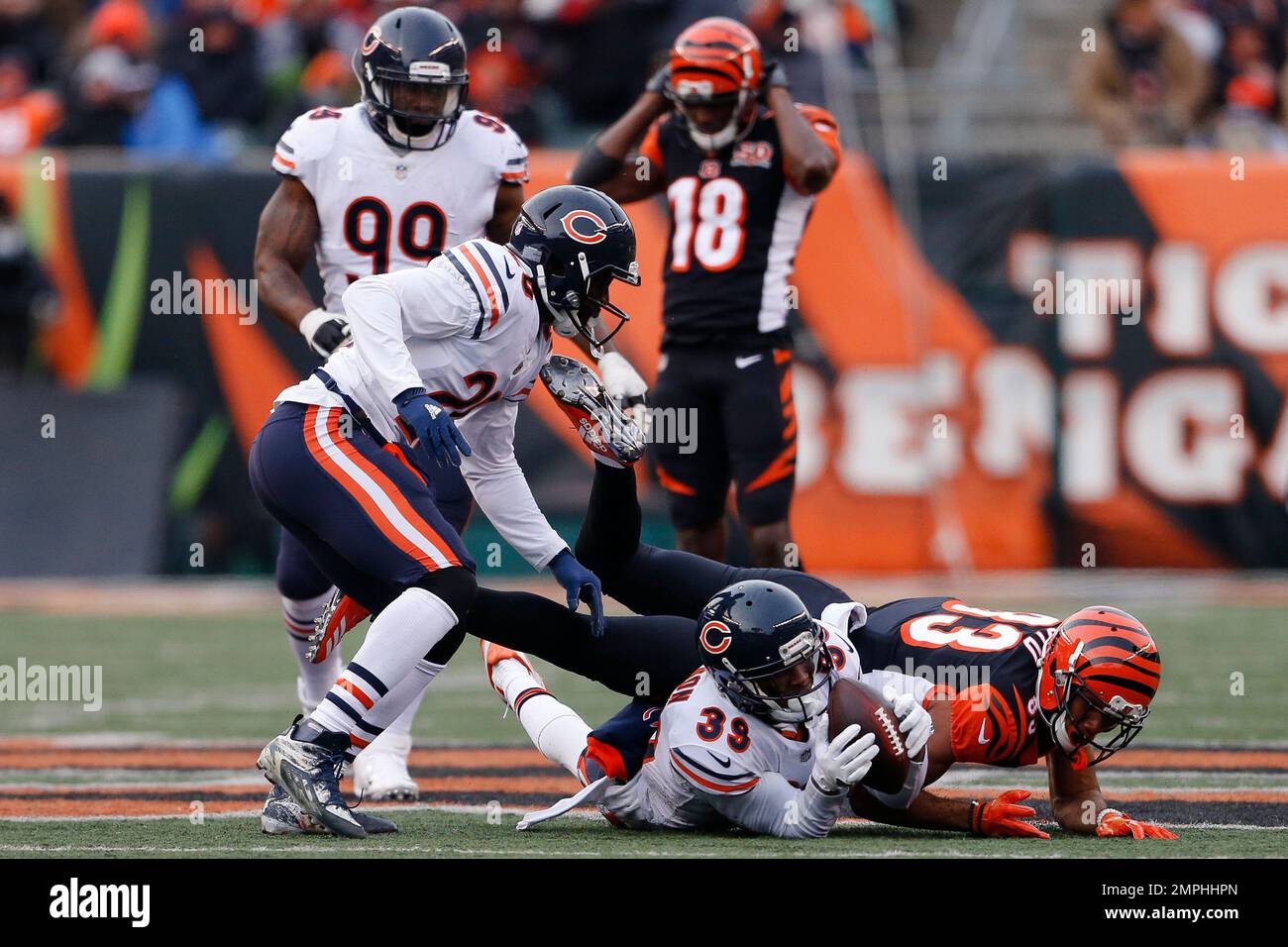 Chicago Bears safety Eddie Jackson (38) intercepts the football from  Cincinnati Bengals' A.J. Free (18) during the second half of play against  the Cincinnati Bengals at Paul Brown Stadium in Cincinnati, Ohio