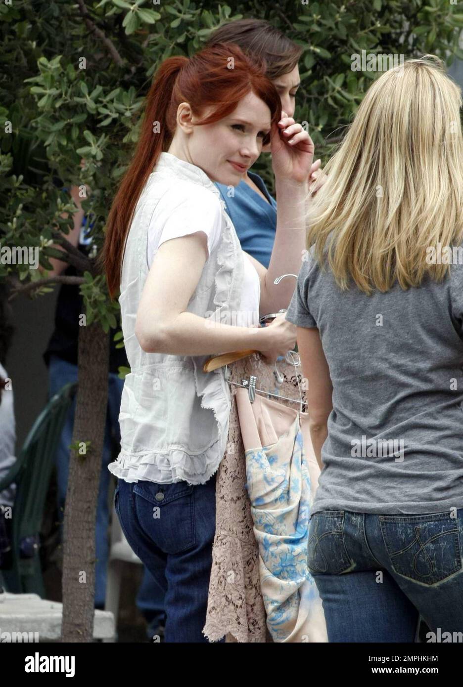 EXCLUSIVE!! Bryce Dallas Howard looks cute in a white top and jeans as she arrives for an appearance on the 'Chelsea Lately Show' to promote her new film 'Twilight Saga: Eclipse' in theaters today. Los Angeles, CA. 6/29/10. Stock Photo