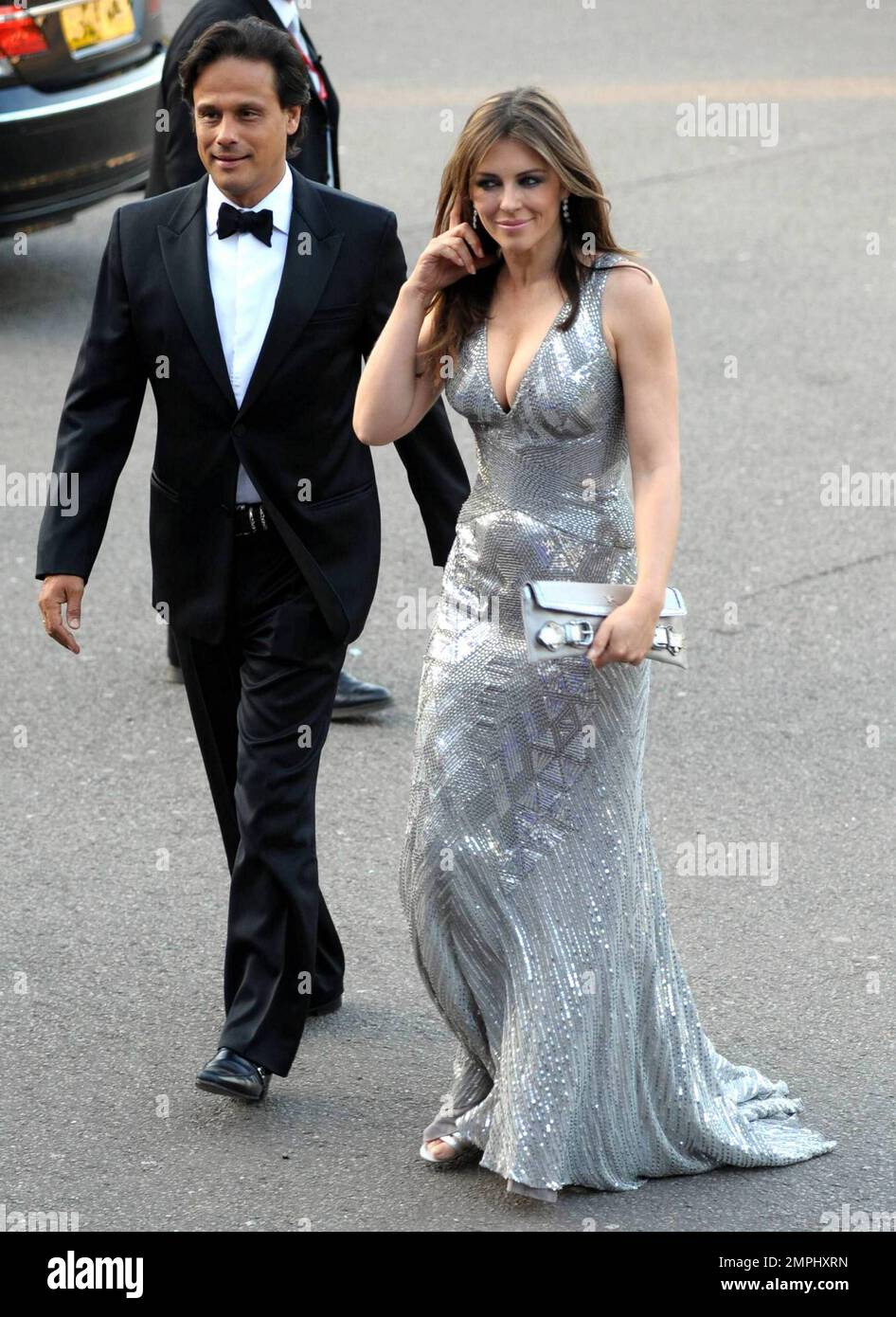 Elizabeth Hurley and Arun Nayar at the Caudwell Children Butterfly Ball in London, UK. 5/20/10   . Stock Photo