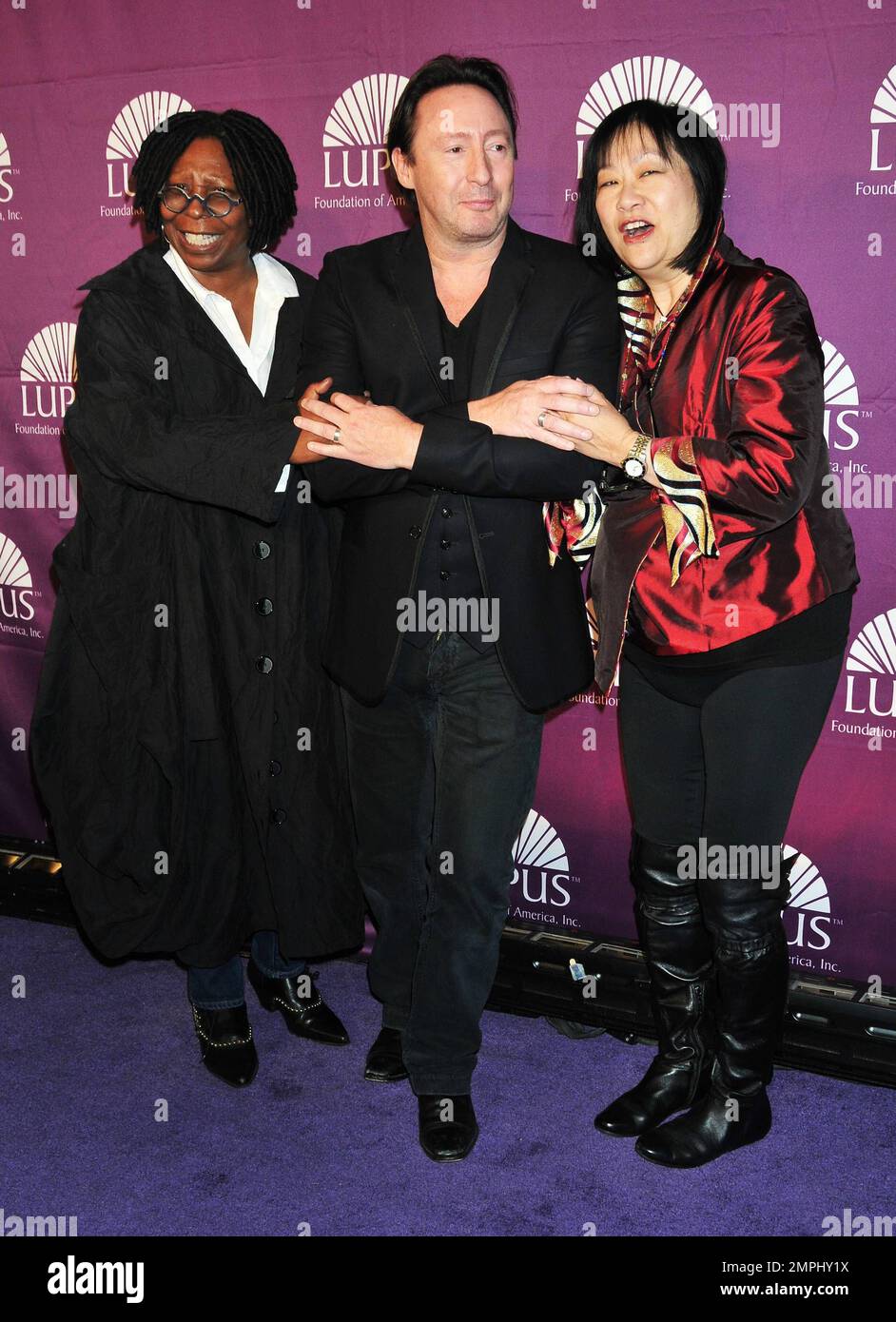 Whoopi Goldberg, Julian Lennon and May Pang at the Lupus Foundation Butterfly Gala in New York, NY. 11th October 2011.  . Stock Photo