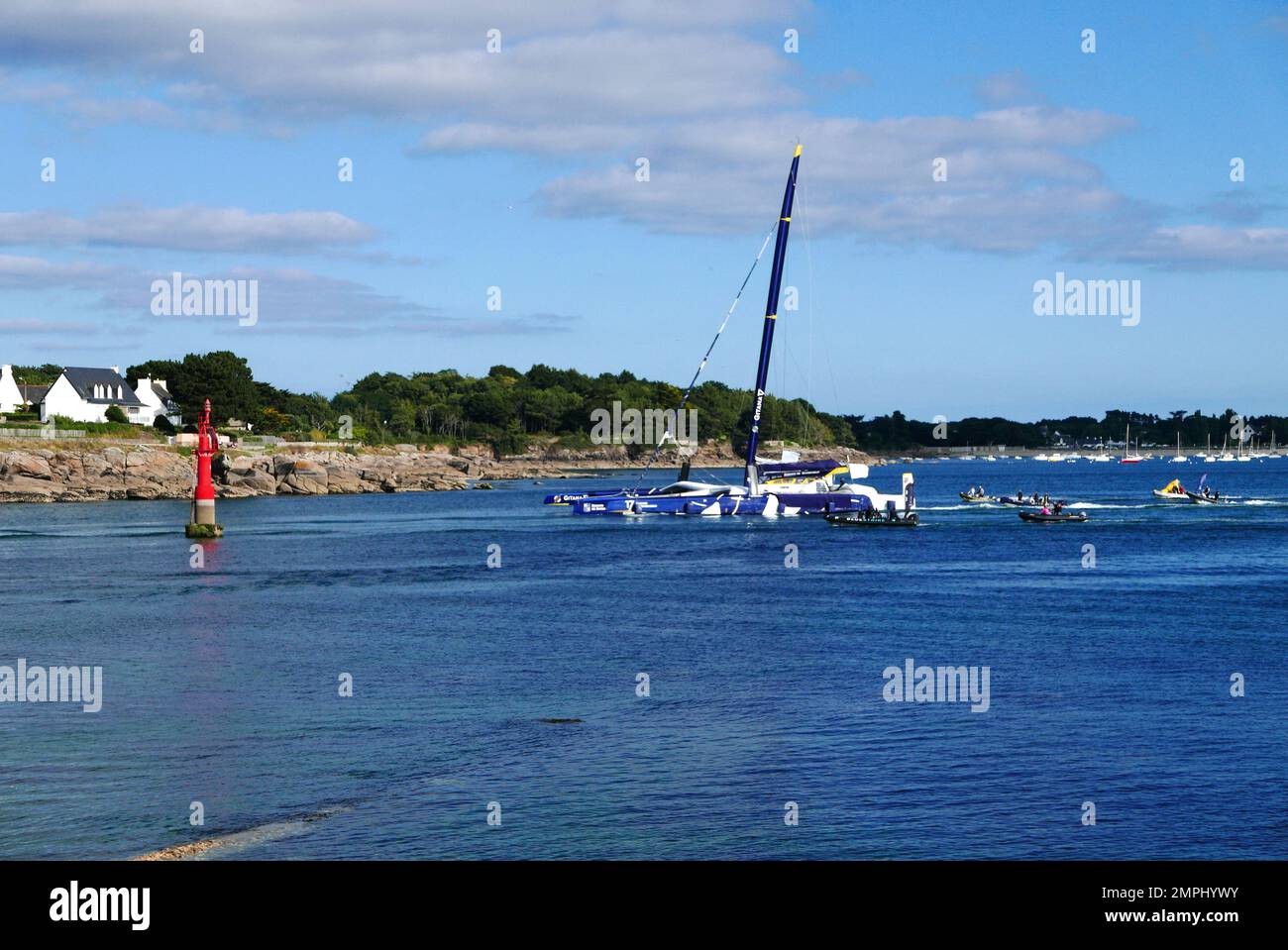 Maxi Edmond de Rothschild entering in Concarneau port, walled town, medieval ville close, Finistere, Bretagne,Brittany, France Stock Photo