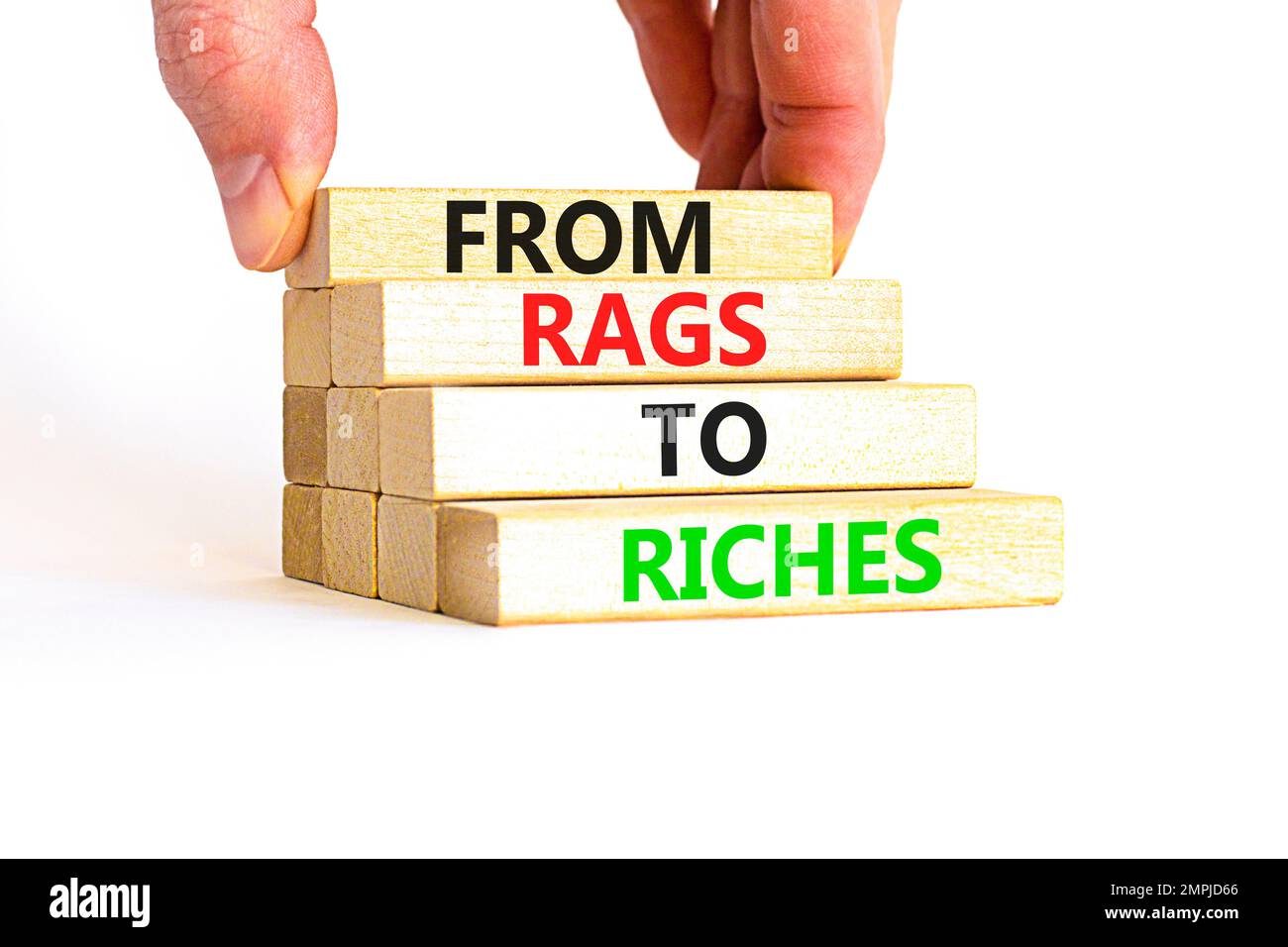 Rags or riches symbol. Concept words From rags to riches on wooden ...