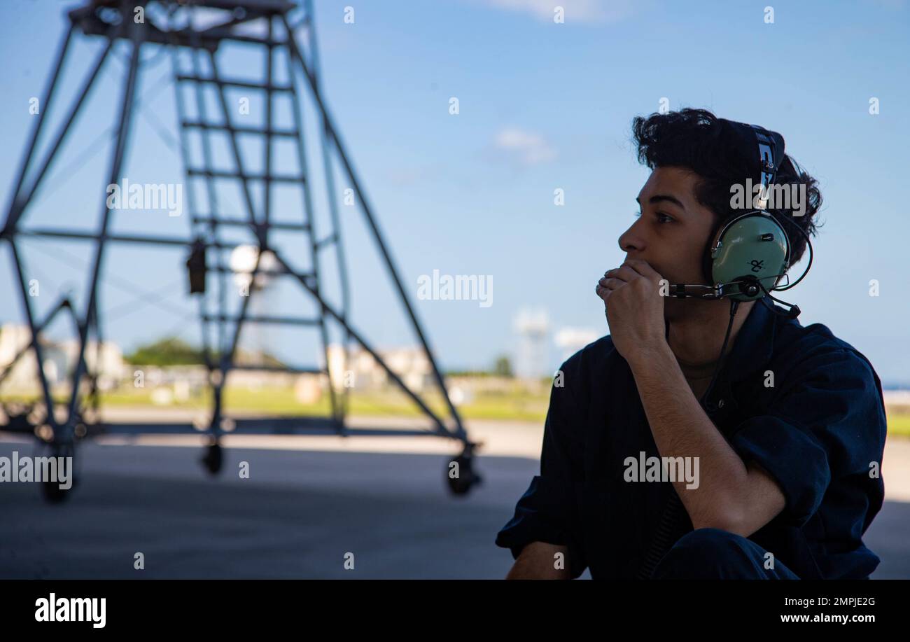 U.S. Air Force Airman 1st Class Antonio Caraballo, a crew chief with 67th Fighter Squadron, Aircraft Maintenance Unit performs start-up procedures during exercise Katana Strike at Kadena Air Base, Okinawa, Japan, Oct. 26, 2022. Katana Strike is led by III Marine Expeditionary Force Information Group and is designed to demonstrate proficiency in coalition joint-force planning, coordination, and execution of dynamic targeting in a maritime environment that utilizes ground forces to initiate the targeting cycle. Katana Strike showcases 5th Air Naval Gunfire Liaison Company, which serves as the ce Stock Photo