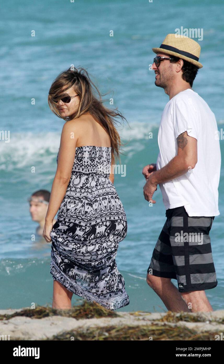 Carmen Electra looks windswept as she takes a stroll on Miami Beach in ...