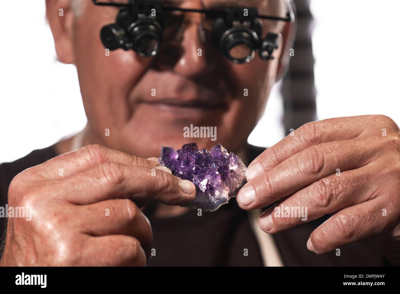 Hand holding amethyst hi-res stock photography and images - Alamy