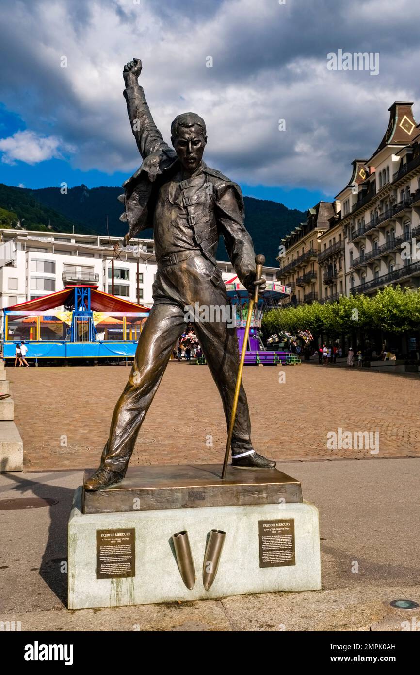 An artful brass statue of Freddie Mercury in the center of the town Montreux, on the shore of
