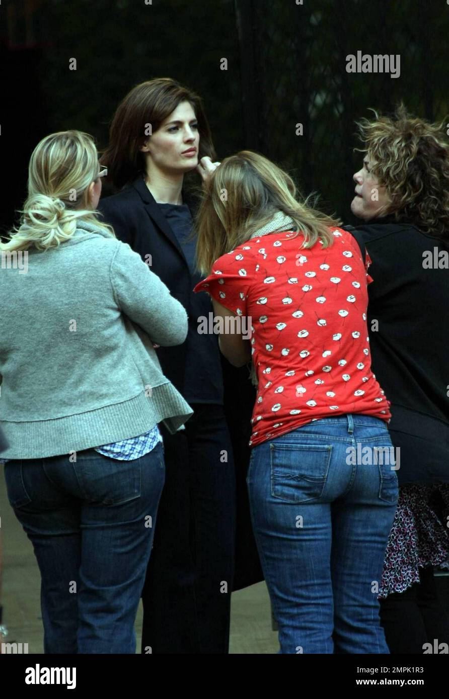 Nathan Fillion and Stana Katic film a scene on the set of 'Castle' in Los Angeles, CA. 12/3/09. Stock Photo