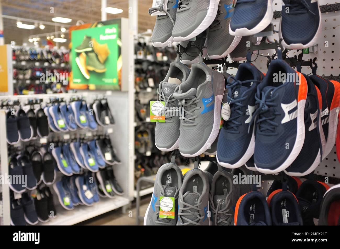 Cheap shoes selection at a Walmart store in Canada Stock Photo