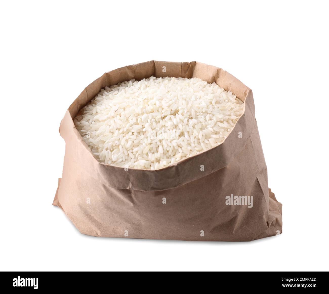 Uncooked rice in paper bag isolated on white Stock Photo - Alamy