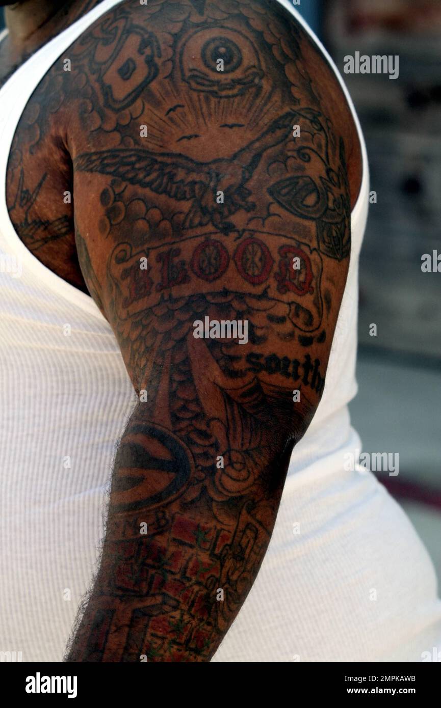exclusive!!-singer-and-the-voice-judge-cee-lo-green-shows-off-his-tattoos-in-a-white-tank-top-as-he-leaves-the-restaurant-tart-in-los-angeles-ca-25th-july-2012-2MPKAWB.jpg