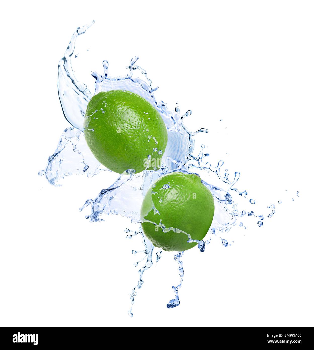 Ripe limes and splashing water on white background Stock Photo Alamy