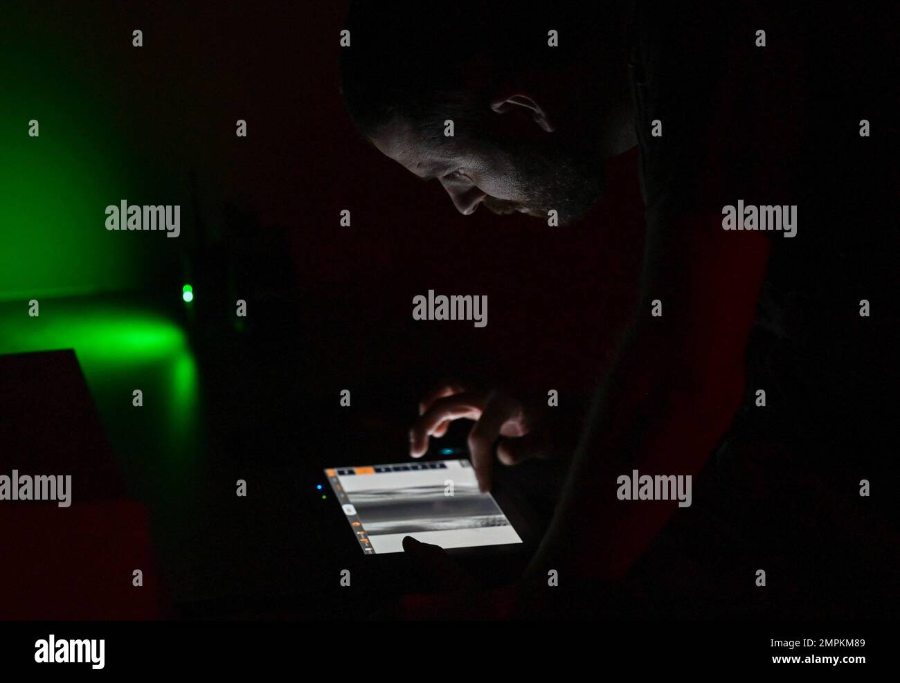 A member of the Arizona-based FBI examines an x-ray of an explosive vest during a joint training exercise in Tucson, Arizona, Nov. 2, 2022. During the training, everyone focused on booby trap detection and deactivation, hostage rescue and identifying potential WMDs. Stock Photo