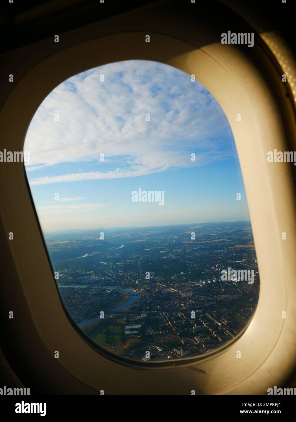 View from an airplane window on a clear summer day above dresden Stock Photo