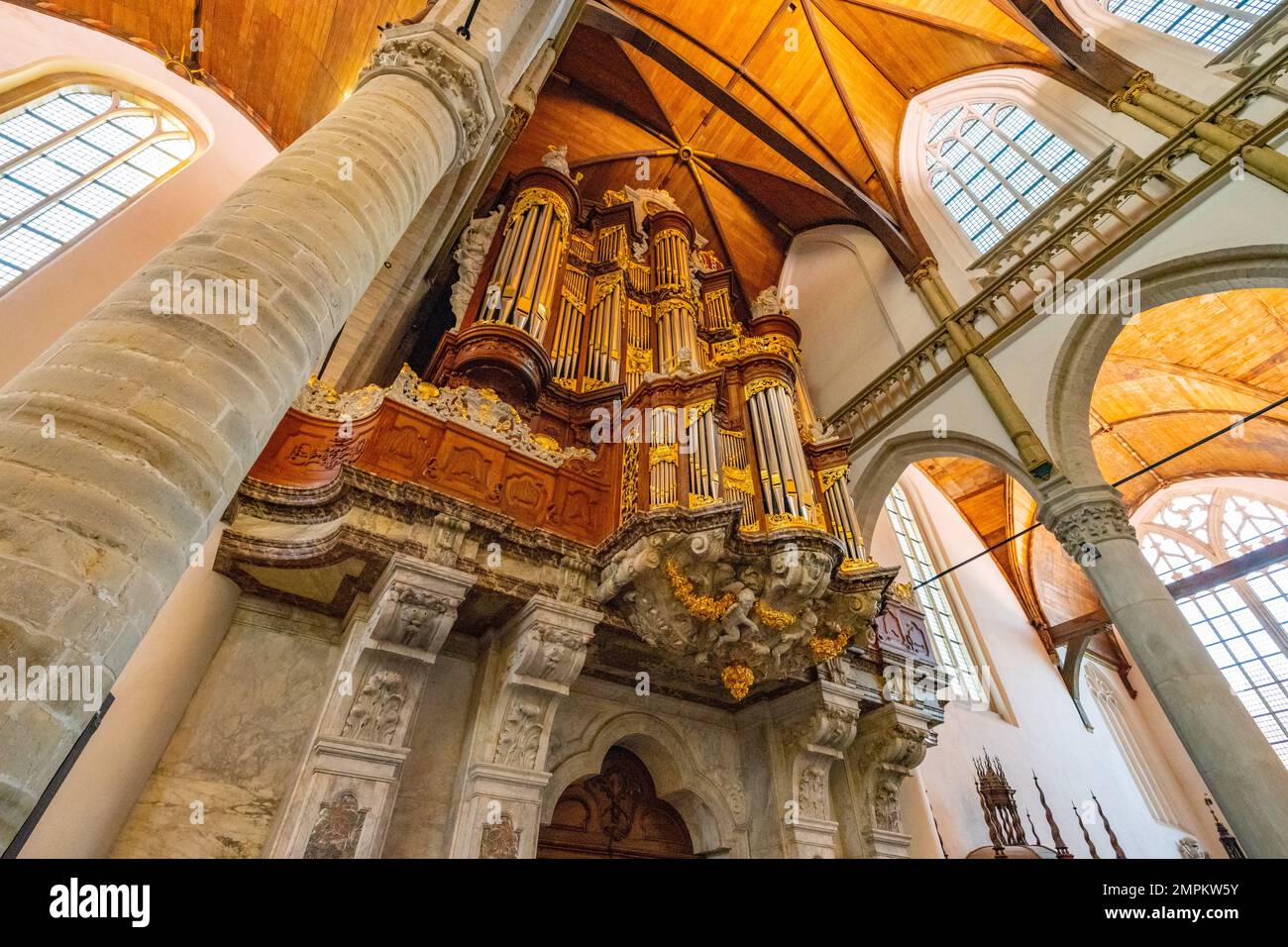 Interiora and great organ of the The Oude Church Amsterdam Netherlands. Stock Photo