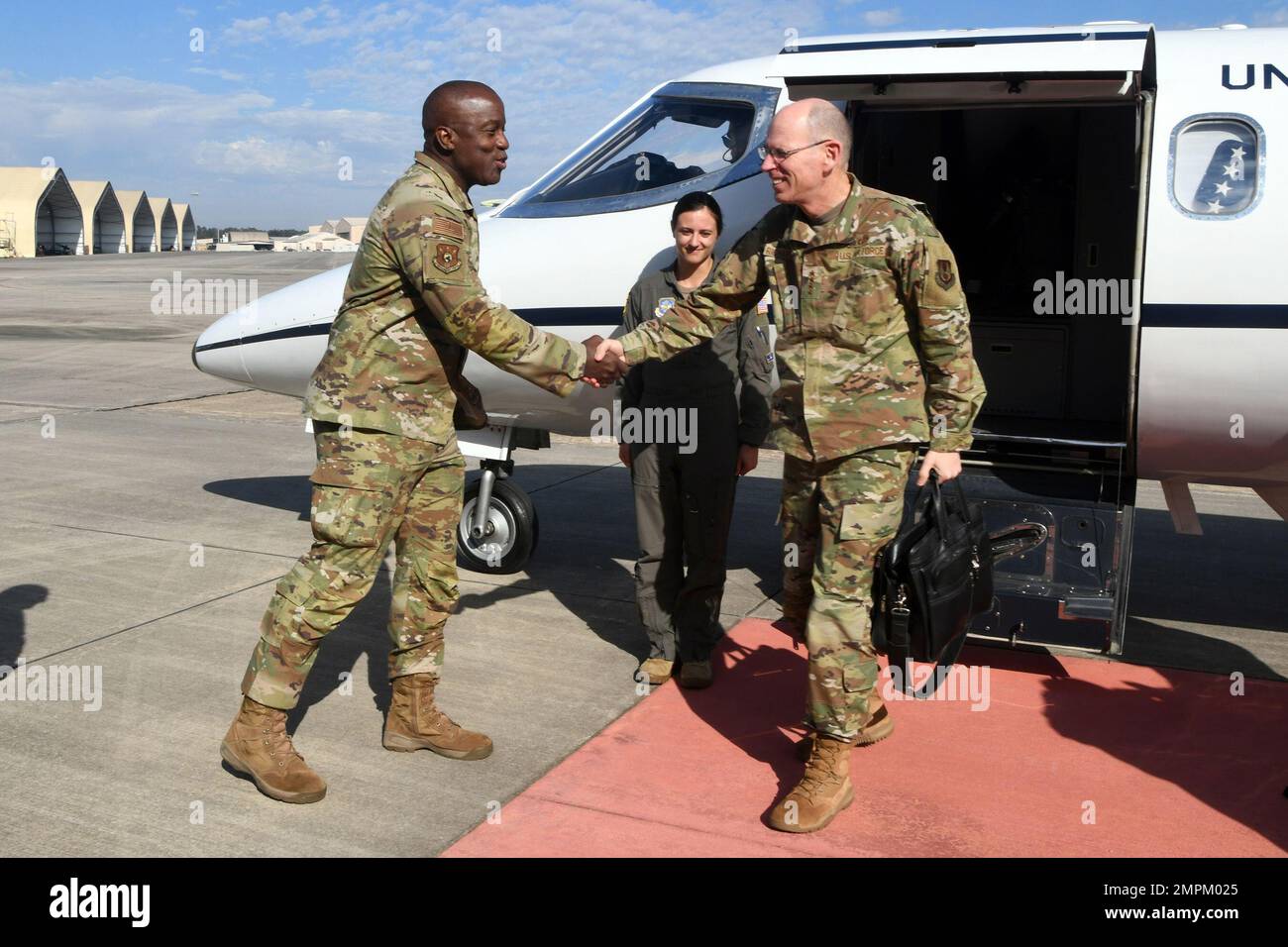 ROBINS AIR FORCE BASE, Ga. – Lt. Gen. Stacey Hawkins, left, Air Force Sustainment Center commander, greets Gen. Duke Z. Richardson, Air Force Materiel Command commander, as he arrives at Robins Air Force Base, Georgia, Nov. 2, 2022. Richardson visited the installation to view ongoing mission activities and receive updates on future plans. Stock Photo