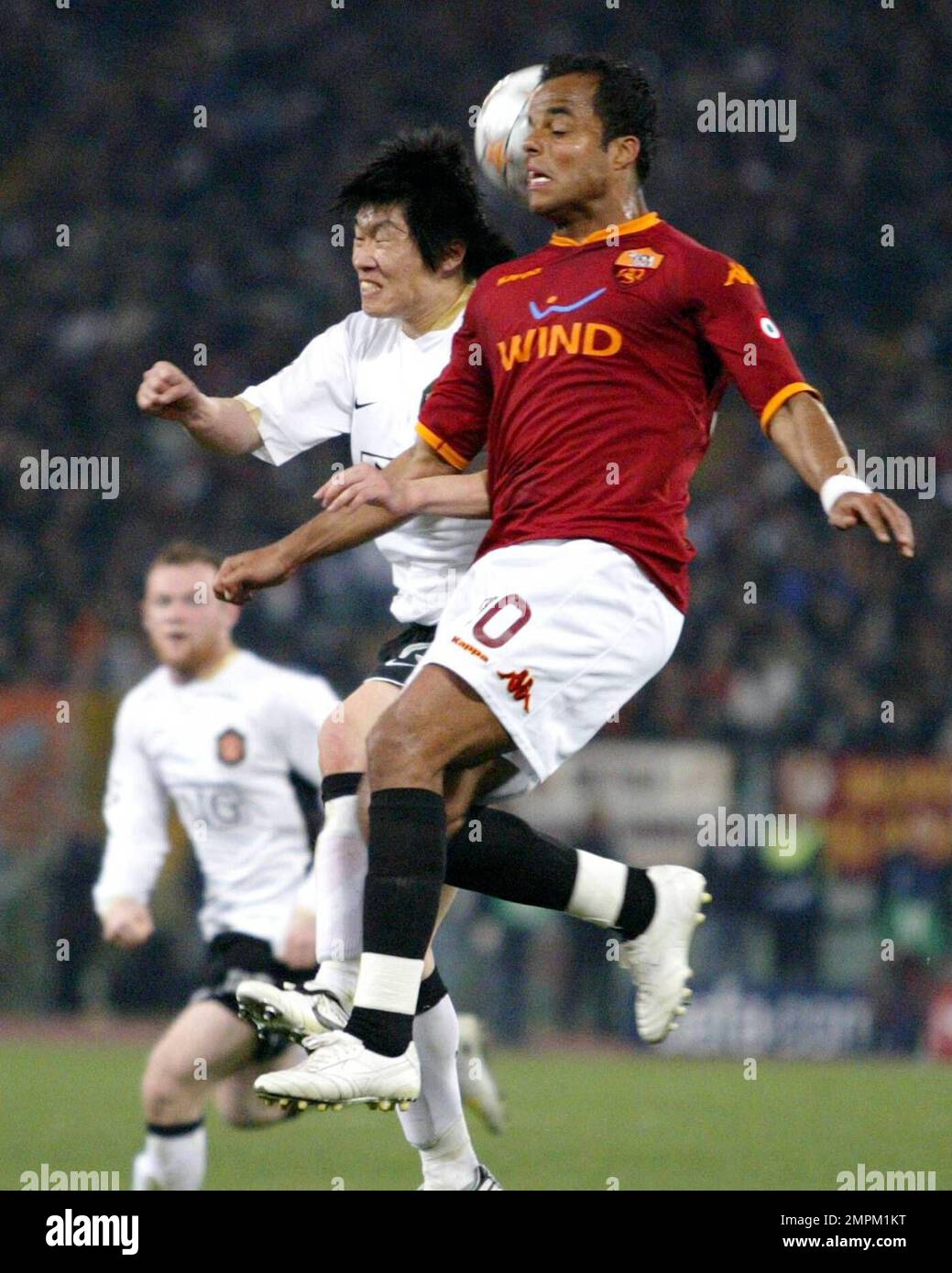 Roma Players Mancini right fight a ball with Park Ji-Sung during the ...