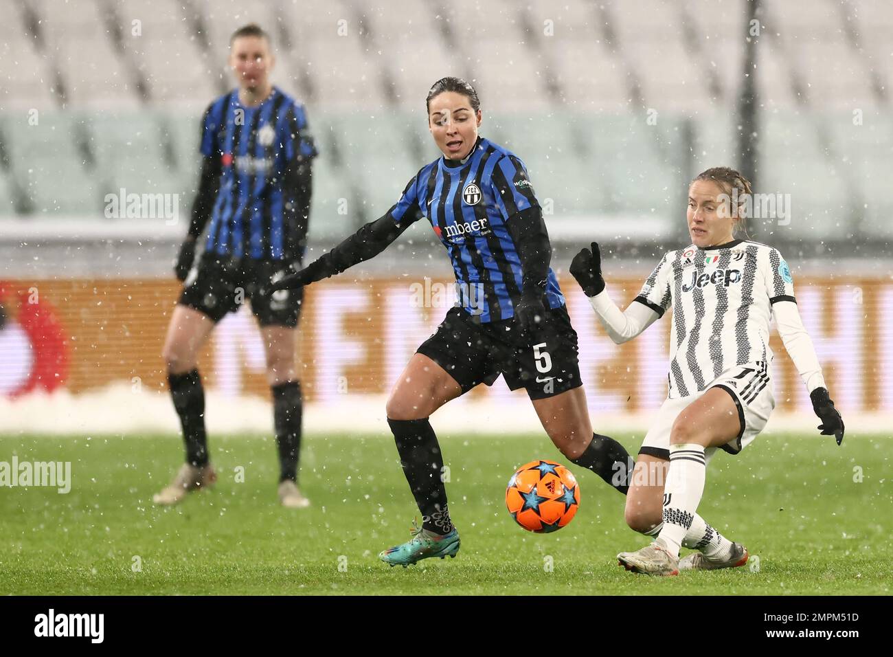 Turin, Italy, 15th December 2022. Valentina Cernoia of Juventus passes the ball as Vanessa Bernauer of FC Zurich closes in during the UEFA Womens Champions League match at Juventus Stadium, Turin. Picture credit should read: Jonathan Moscrop / Sportimage Stock Photo