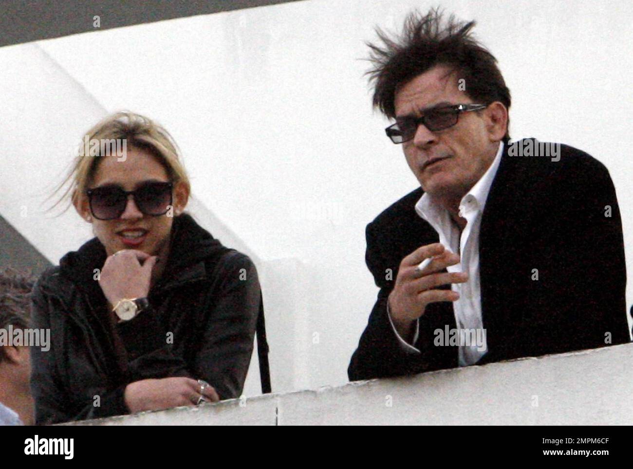 Just hours after reportedly being fired by Warner Bros, Charlie Sheen  leaves the Live Nation offices with 
