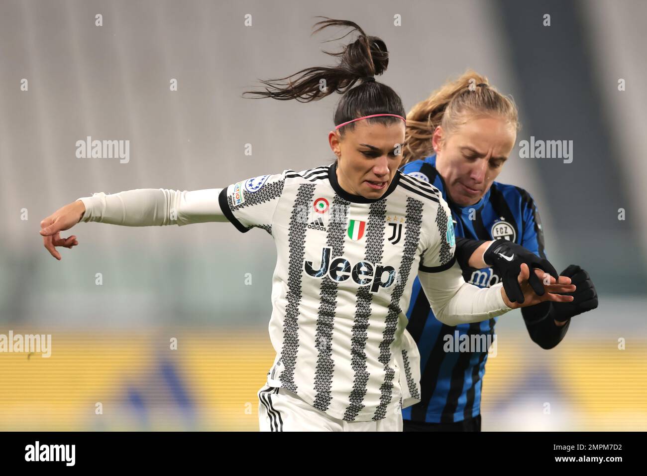 Turin, Italy, 15th December 2022. Irina Pando of FC Zurich tussles with Agnese Bonfantini of Juventus during the UEFA Womens Champions League match at Juventus Stadium, Turin. Picture credit should read: Jonathan Moscrop / Sportimage Stock Photo