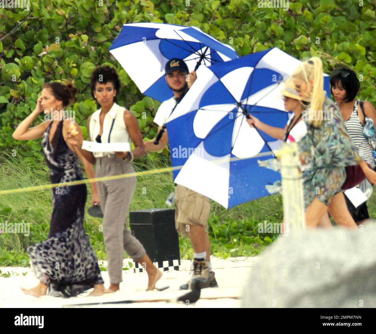 Charlie's Angels films a scene on the beach. The wind seemed to be ...