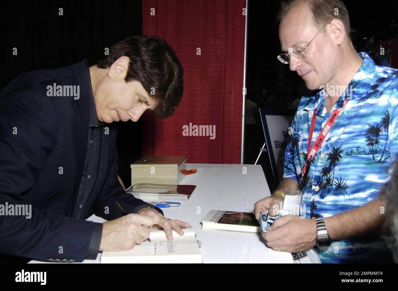 Former Illinois governor Rod Blagojevich who is currently involved in a government scandal attends Wizard World Chicago Comic Con held at The Donald E. Stephens Convention and Conference Center in Rosemont near Chicago.  Earlier this week Blagojevich was convicted by a federal jury of lying to the FBI, but was deadlocked on 23 other charges. The former governor arrived more than an hour late but drew a huge crowd of supporters and detractors.  Blagojevich visited the booths of actors Adam West, Richard Roundtree and John Schneider before setting at his own where he charged $80 for each photo t Stock Photo