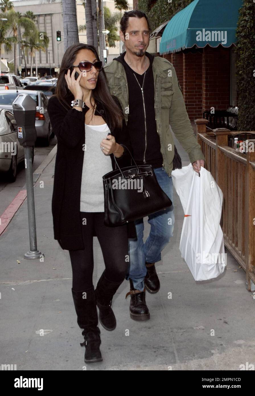 Chris Cornell and wife Vicky head out for a bite on Bedford Drive after some shopping that included a visit to the Nike Store. Beverly Hills CA. 2 19 10 Stock Photo Alamy