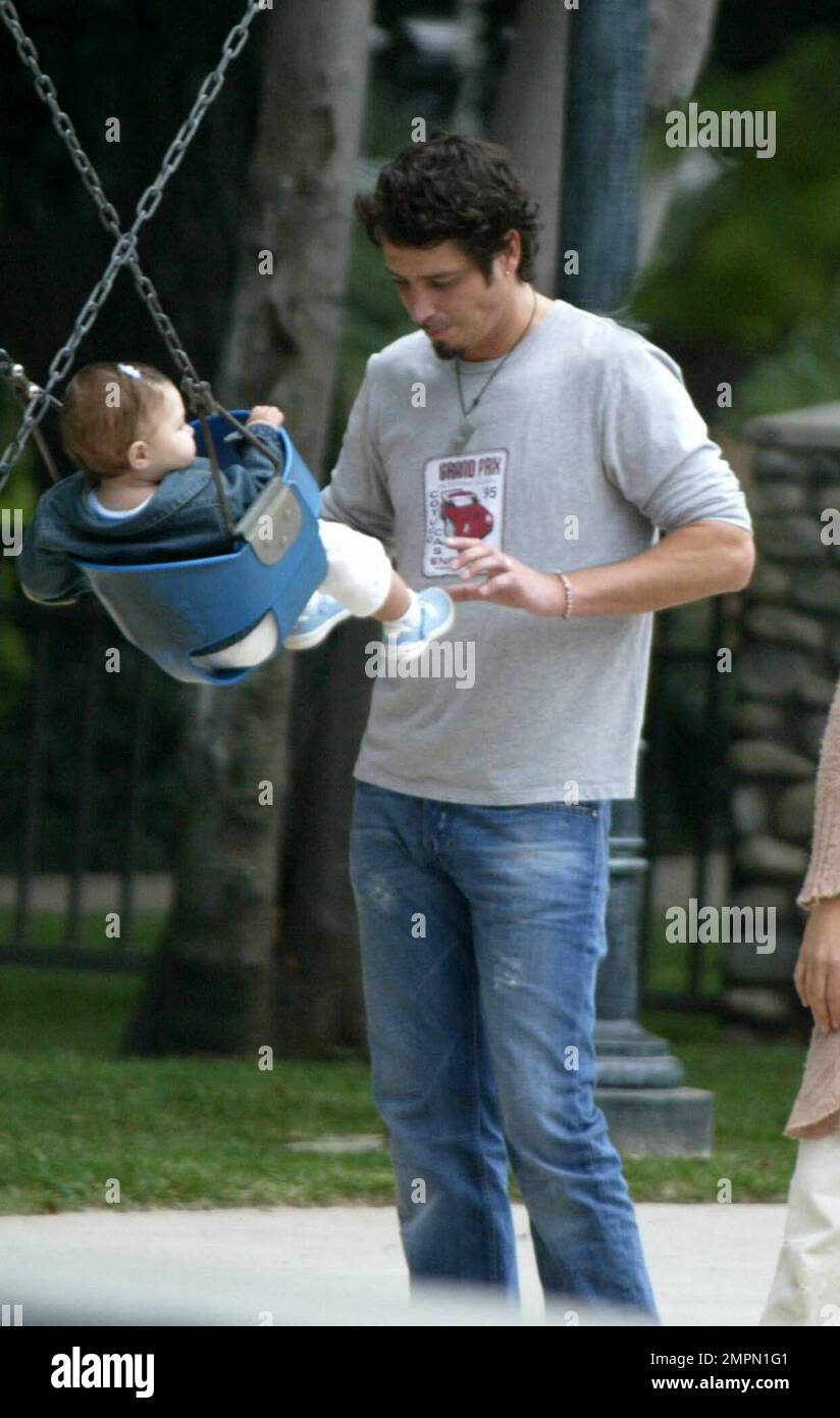 Child pushed on swing hires stock photography and images Alamy
