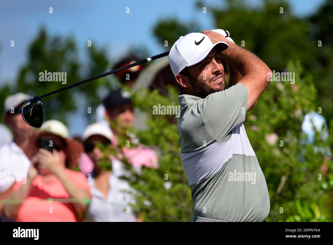 Italy's Francesco Molinari tees off from the first hole during the Hero  World Challenge golf tournament at Albany Golf Club in Nassau, Bahamas,  Thursday, Nov. 30, 2017. (AP Photo/Dante Carrer Stock Photo -