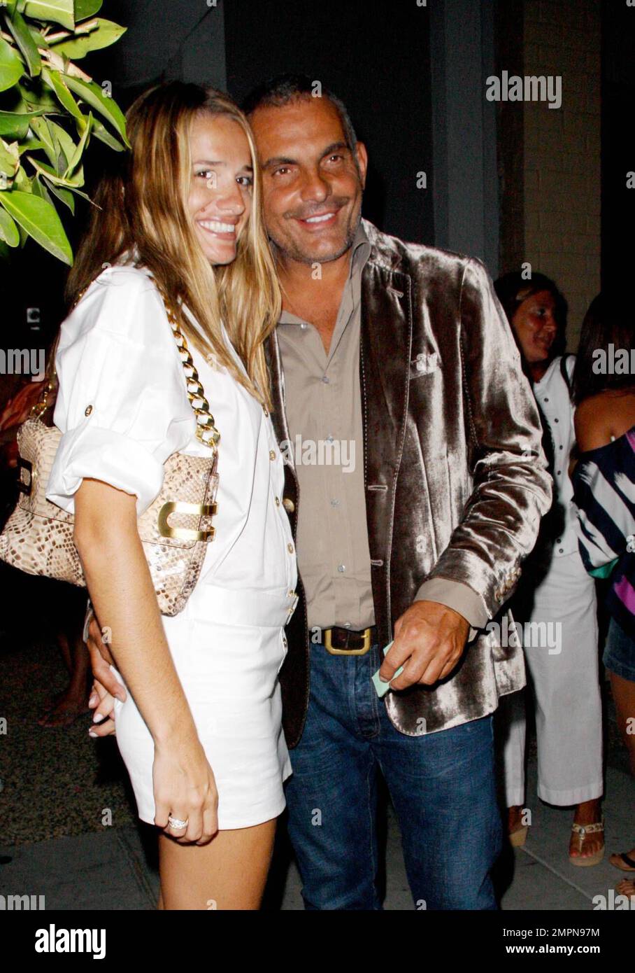Fashion Designer Christian Audigier and his wife Ira attend a redcarpet event at Kitson in Los