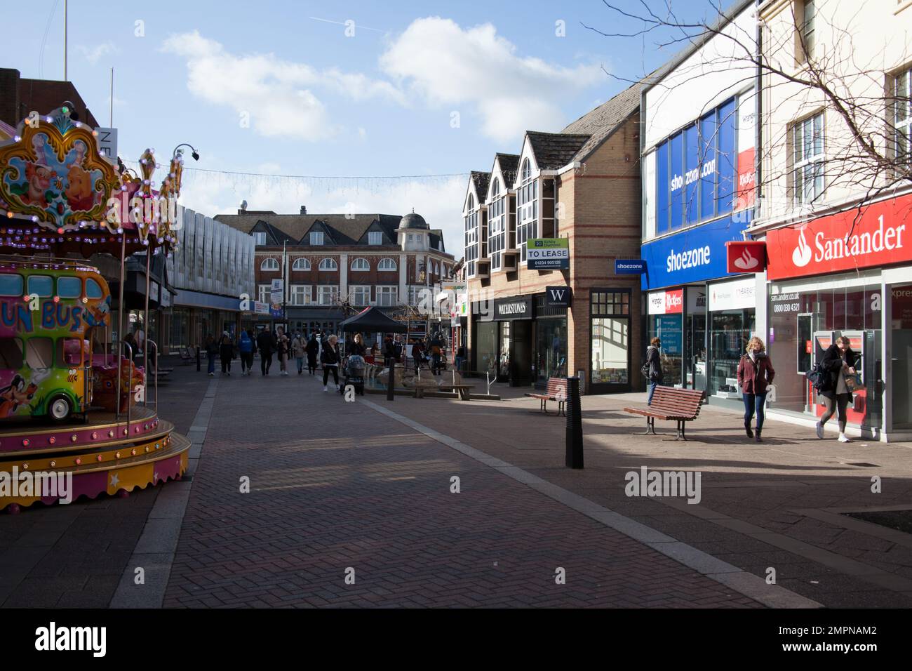 Shoppers in Bedford in the town centre in Bedfordshire in the UK Stock