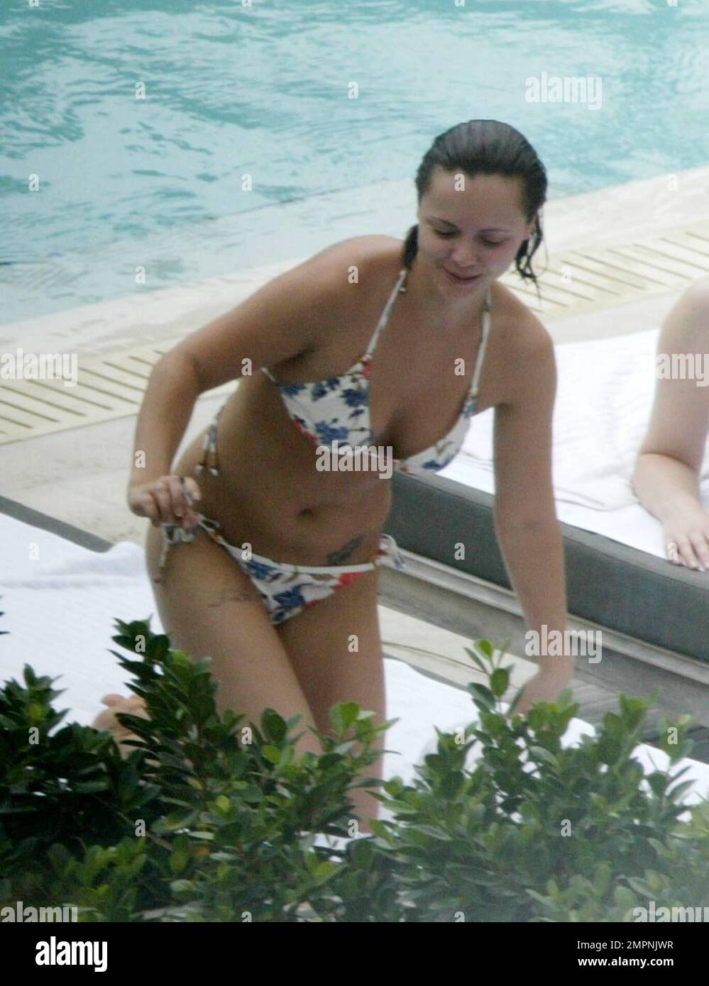 Exclusive!! Christina Ricci spends an afternoon poolside at a Miami Beach  hotel. The actress spent the day with five girlfriends, drank, smoked,  swam, clowned around and chatted to handsome pool attendants. 5/12/05