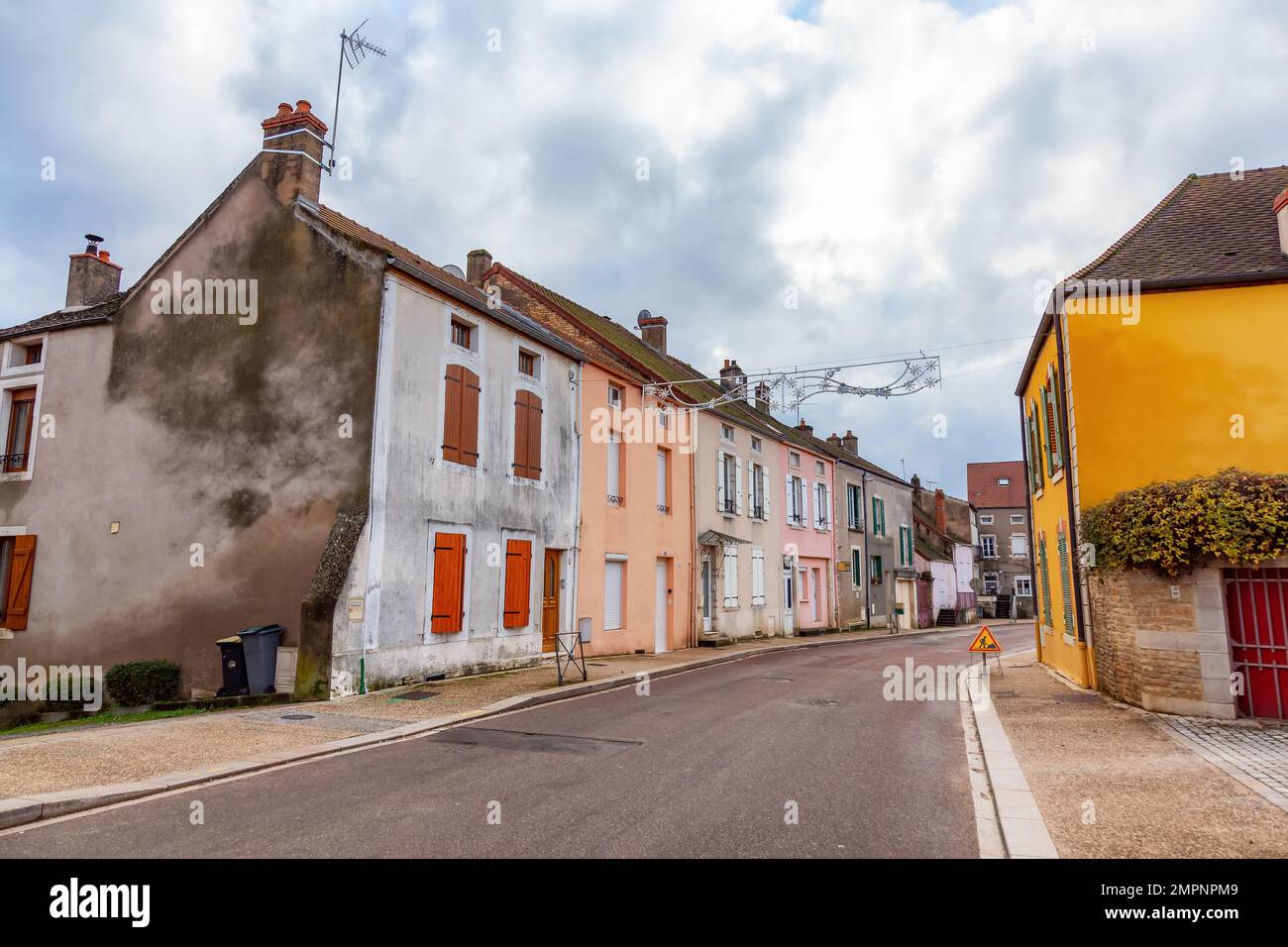 Streets in a small touristic town during cloudy fall season evening. Stock Photo