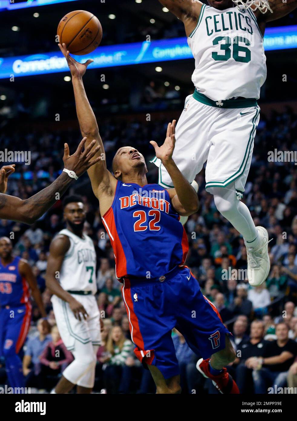 Boston Celtics' Marcus Smart (36) fouls Detroit Pistons' Avery Bradley