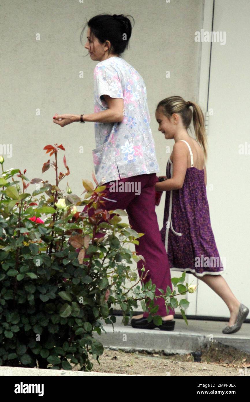 Coco Arquette pays a visit to her mother, who wore scrubs on the set of