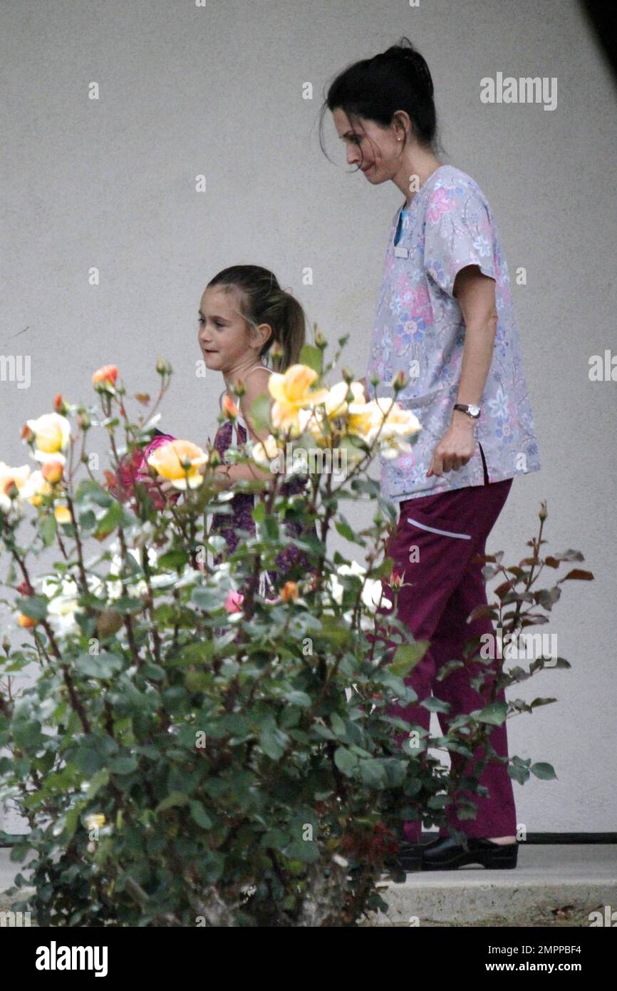Coco Arquette pays a visit to her mother, who wore scrubs on the set of