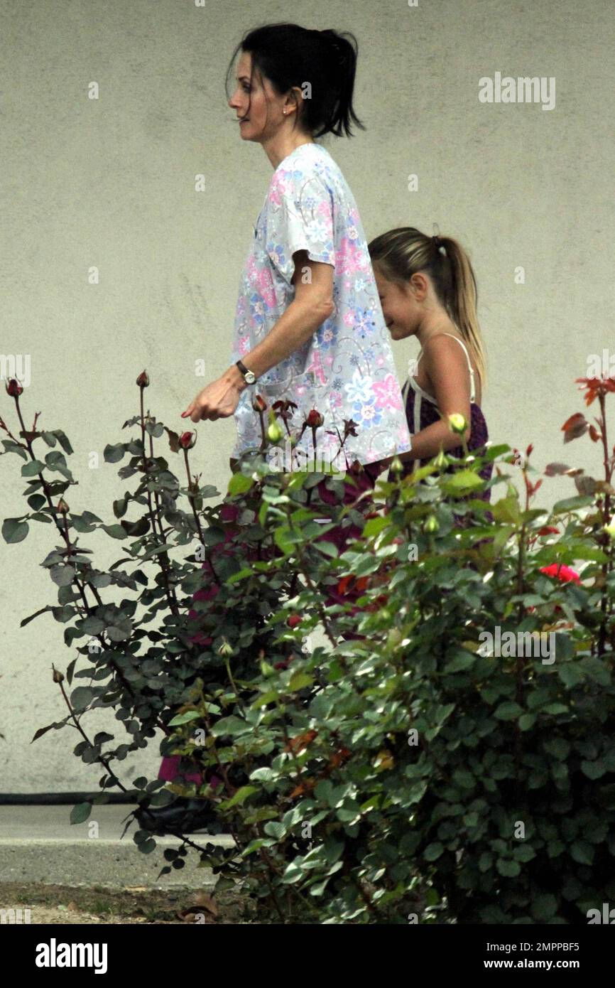 Coco Arquette pays a visit to her mother, who wore scrubs on the set of