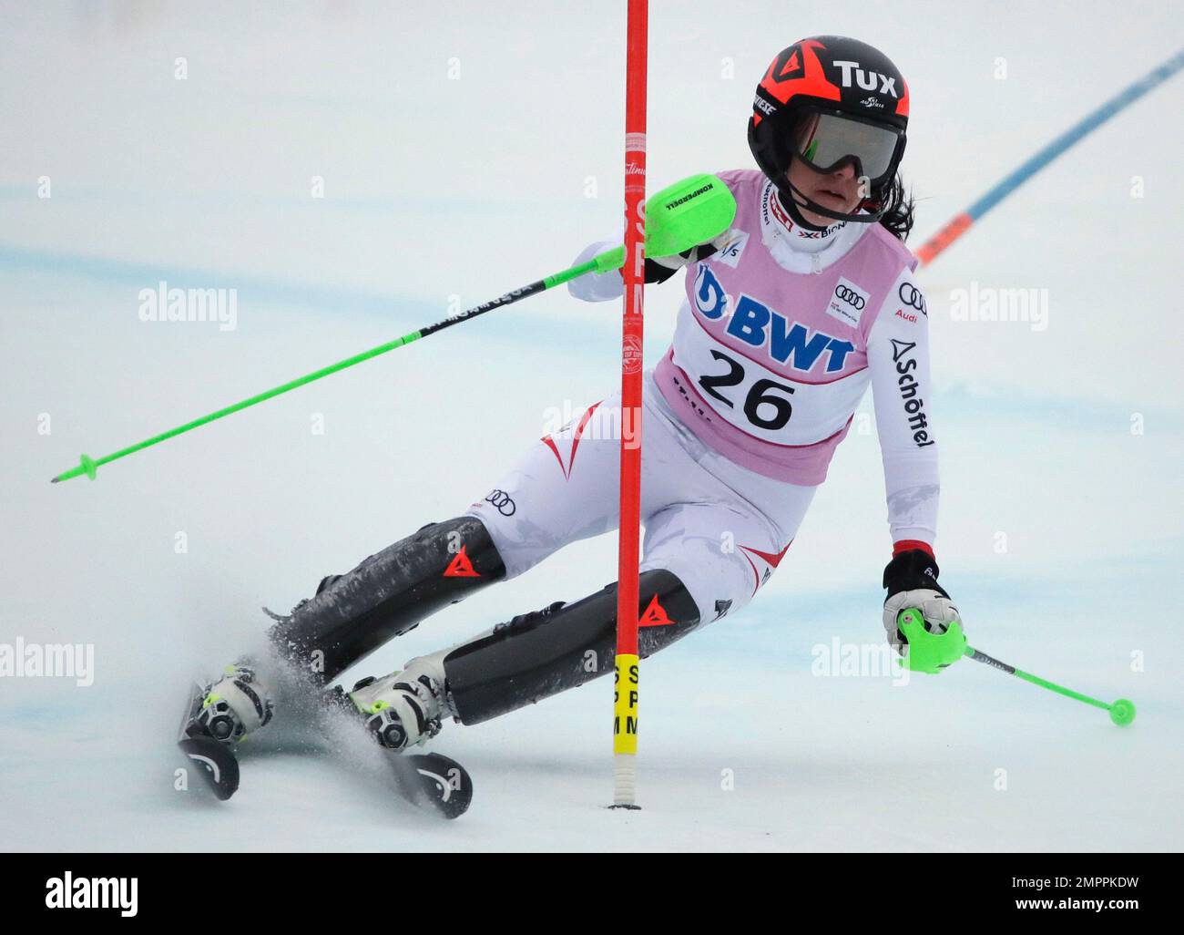 Stephanie Brunner, of Austria, competes during her first run in the
