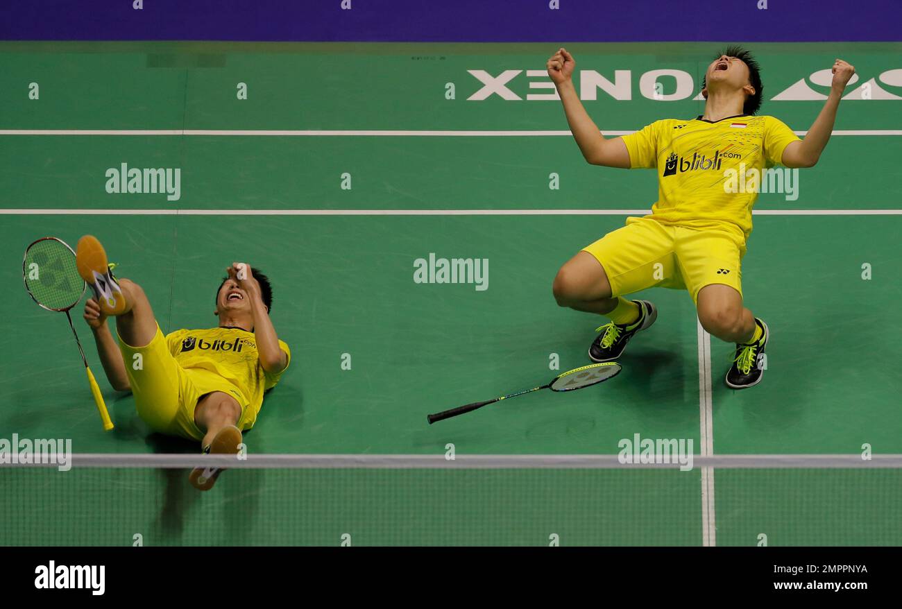 Marcus Fernaldi Gideon, right, and Kevin Sanjaya Sukamuljo of Indonesia celebrate after defeating Mads Conrad-Petersen and Mads Pieler Koiding of Denmark in the mens double final during the Yonex-Sunrise Hong Kong Open