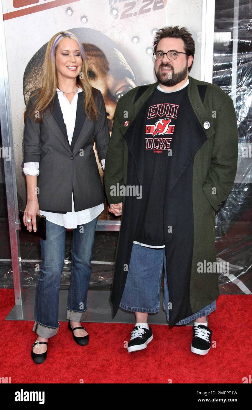 Kevin Smith (R) and wife Jennifer Schwalbach at the world premiere of 'Cop Out' in New York, NY. 2/22/10. Stock Photo