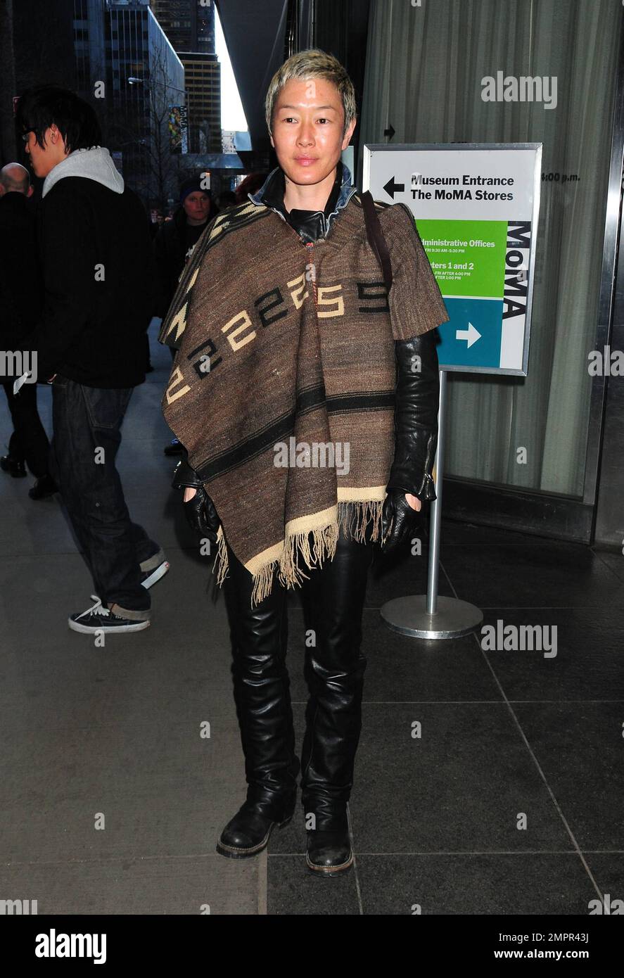 Jenny Shimizu arrives at the screening of David Ebersole's documentary 'Hit So Hard' at the Museum of Modern Art. The documentary is about former Hole drummer Patty Schemel. The screening marks the first public gathering of Hole in over a decade and, as part of the event, Love joined band members Patty Schemel, Eric Erlandson and Melissa auf der Maur for a Q&A following the screening. New York, NY. 3/28/11. Stock Photo