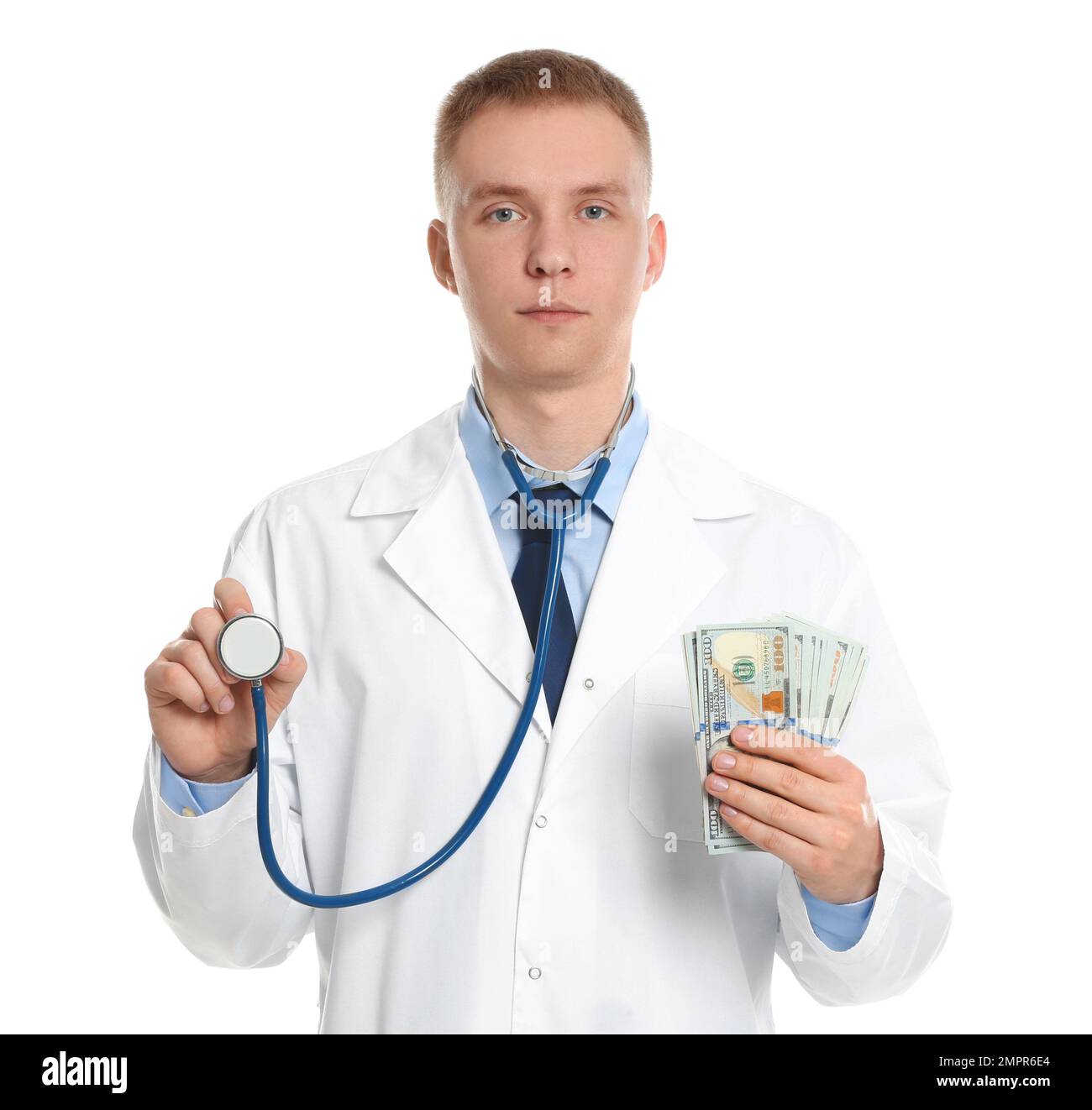 Doctor with bribe and stethoscope on white background. Corruption in ...