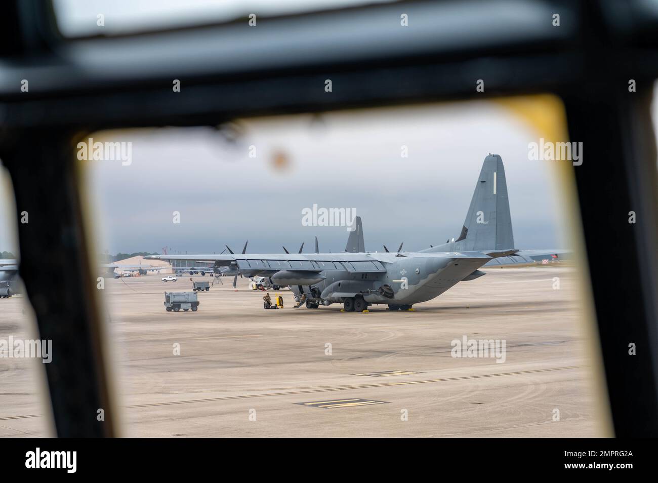 A AC130J Ghostrider gunship sits parked on the flight line at Hurlburt