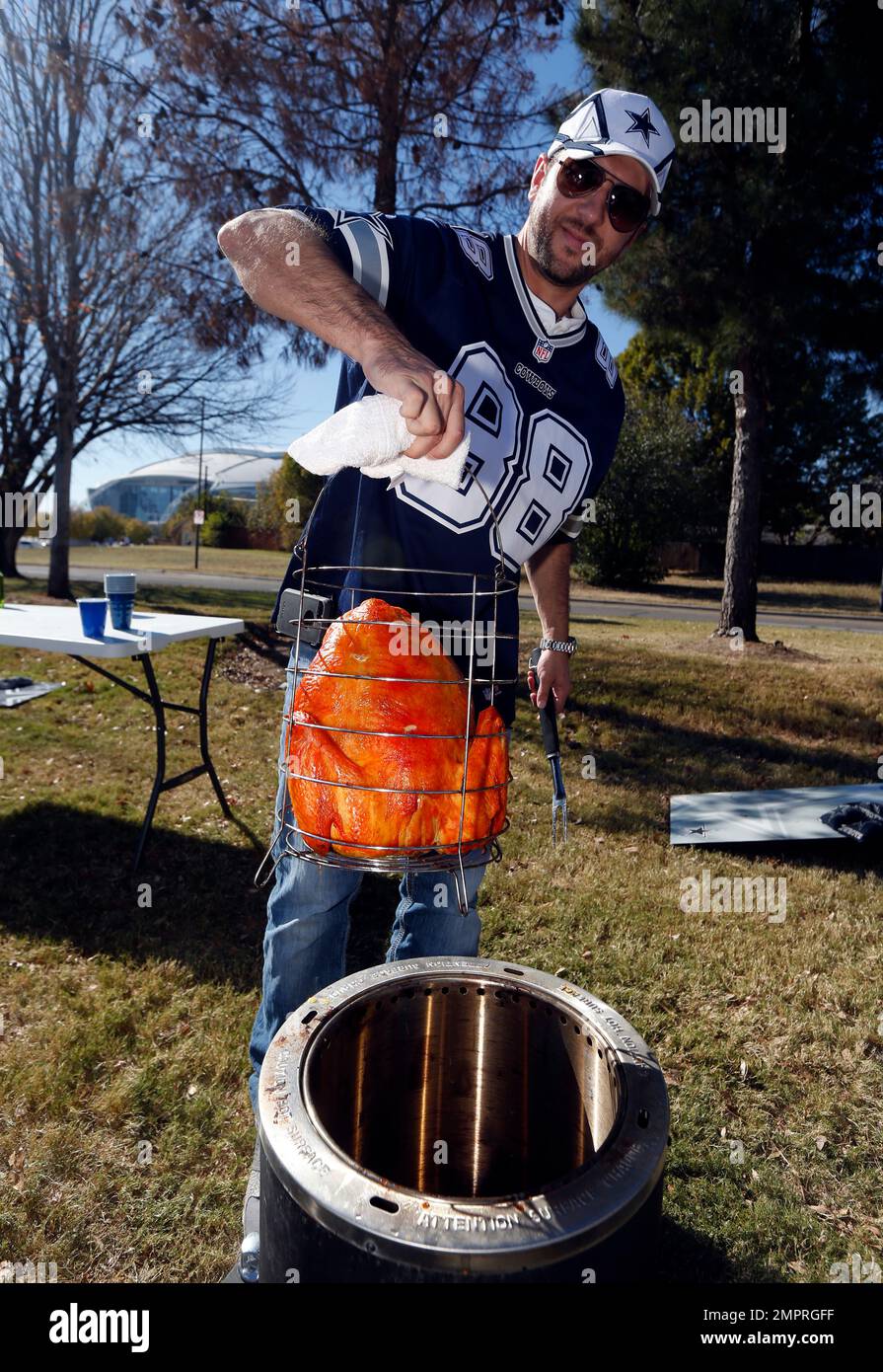 David Seilhamer of Killeen, Texas, shows off his fried turkey as he